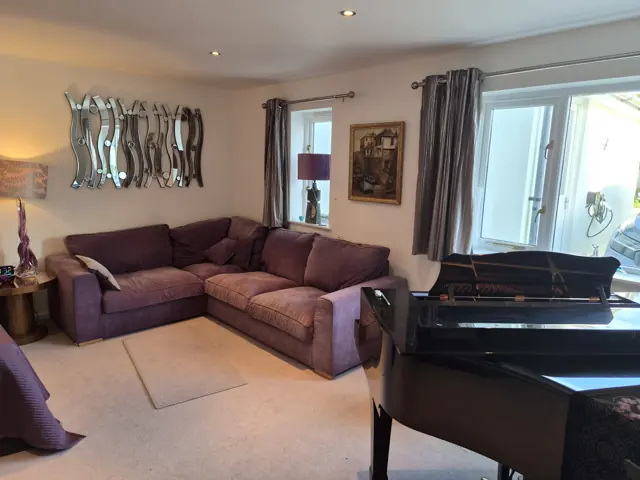 The grand piano in the teaching room